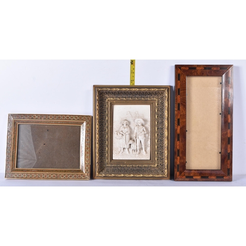 3394 - A framed marble relief Plaque of field workers together with a two other picture frames .Plaque 14.4... 