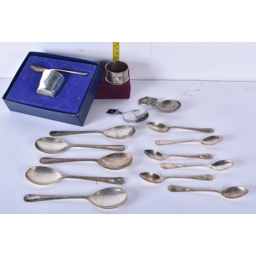 3408 - A silver napkin together with silver plated items, weight of silver napkin 14.6g(15)