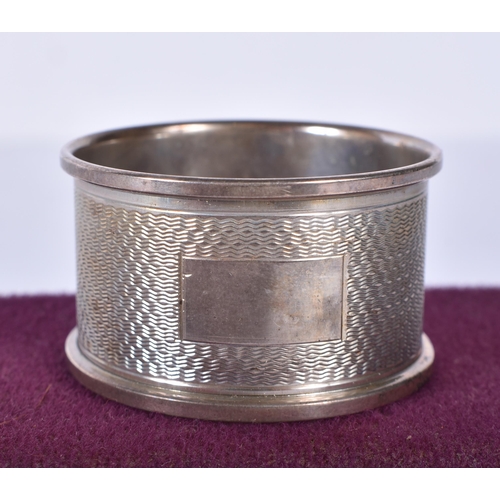 3408 - A silver napkin together with silver plated items, weight of silver napkin 14.6g(15)