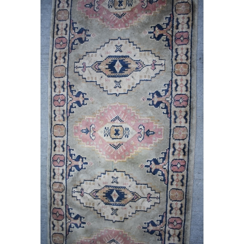 3414 - An Anatolian runner rug 230 x 68cm