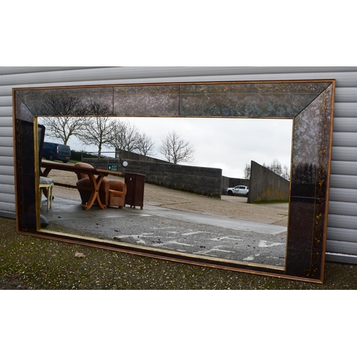 3430 - A large 20th century wooden framed Venetian style mirror with glass panelled surrounds with de-silve... 