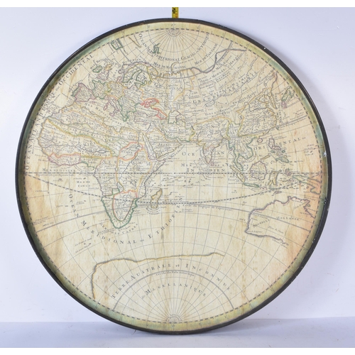 3450 - A world map table top .59cm diameter.