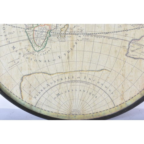 3450 - A world map table top .59cm diameter.