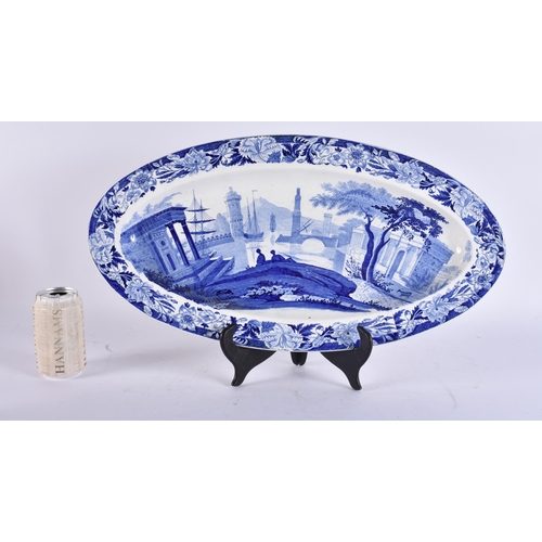 100 - AN UNUSUAL LARGE EARLY 19TH CENTURY WEDGWOOD BLUE AND WHITE DISH decorated with scenes of figures an... 