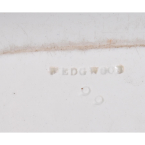 100 - AN UNUSUAL LARGE EARLY 19TH CENTURY WEDGWOOD BLUE AND WHITE DISH decorated with scenes of figures an... 