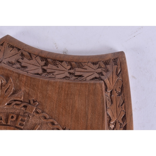 102 - AN UNUSUAL MILITARY INTEREST TREEN WWII ESCAPE LINES MEMORIAL PLAQUE. 28 cm x 18 cm.