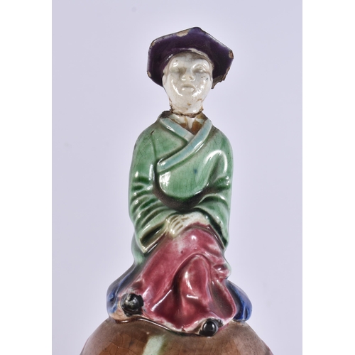 103 - A RARE LARGE PAIR OF 19TH CENTURY MAJOLICA VASES AND COVERS unusually formed with Chinese figures an... 