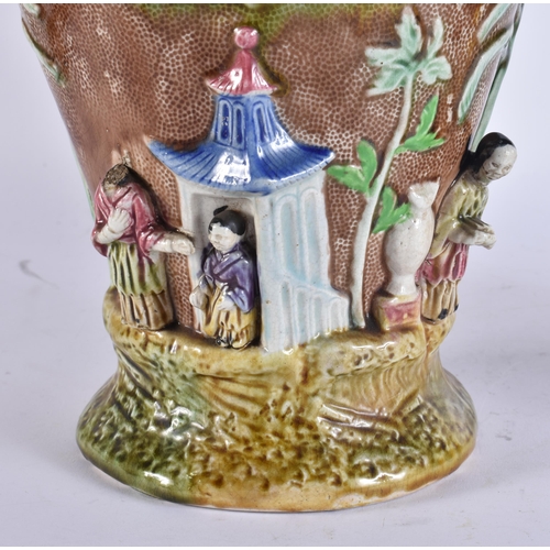 103 - A RARE LARGE PAIR OF 19TH CENTURY MAJOLICA VASES AND COVERS unusually formed with Chinese figures an... 