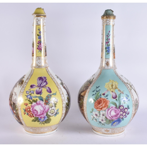 104 - A VERY LARGE PAIR OF 19TH CENTURY GERMAN PORCELAIN BOTTLE VASES AND COVERS painted with lovers in la... 