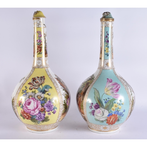 104 - A VERY LARGE PAIR OF 19TH CENTURY GERMAN PORCELAIN BOTTLE VASES AND COVERS painted with lovers in la... 