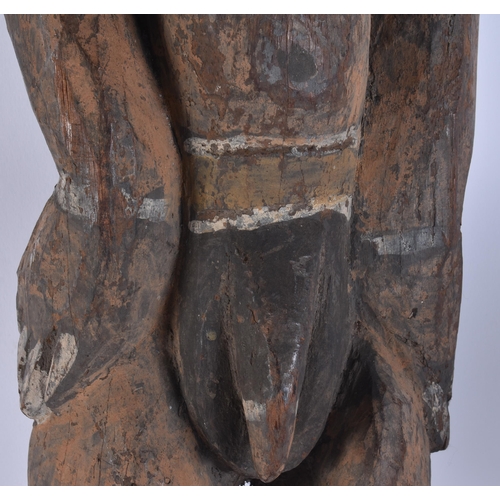 110 - A LARGE TRIBAL PAPUA NEW GUINEA SEPIK RIVER WOOD FIGURE. 85 cm x 15 cm.