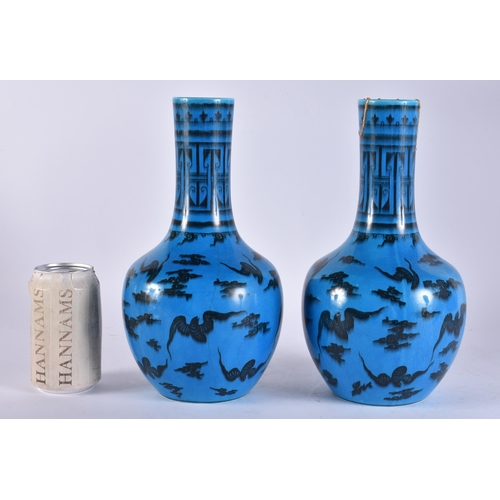 112 - A RARE PAIR OF MINTON TURQUOISE GLAZED VASES painted in the Chinese style with bats. 27.5 cm high.