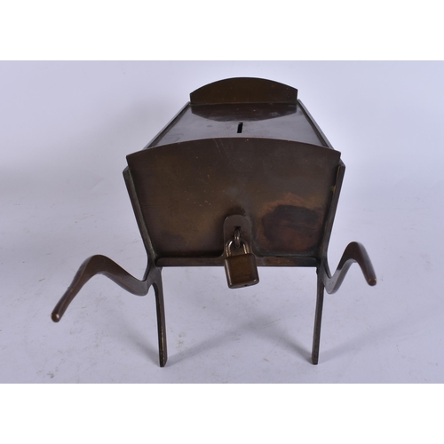 134 - AN ANTIQUE AMERICAN FOLK ART BRONZE WHEELBARROW MONEY BOX. 32 cm x 12 cm.