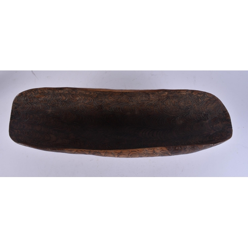 142 - A FINE AND UNUSUAL AUSTRALIAN ABORIGINAL CHIP CARVED BOWL decorated all over with foliage. 52 cm x 1... 