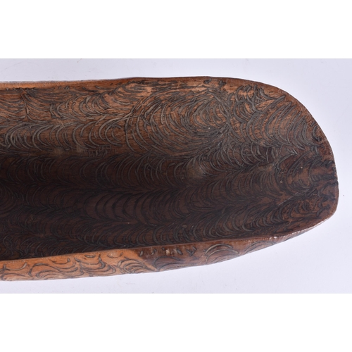 142 - A FINE AND UNUSUAL AUSTRALIAN ABORIGINAL CHIP CARVED BOWL decorated all over with foliage. 52 cm x 1... 