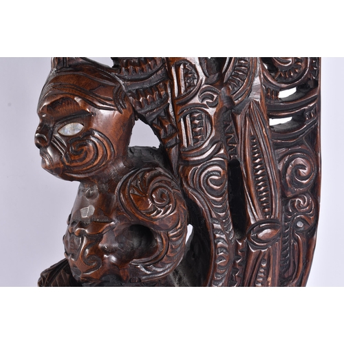 152 - A VERY LARGE NEW ZEALAND MAORI ABELONE SHELL TRIBAL WOOD CARVING. 94 cm x 38 cm.