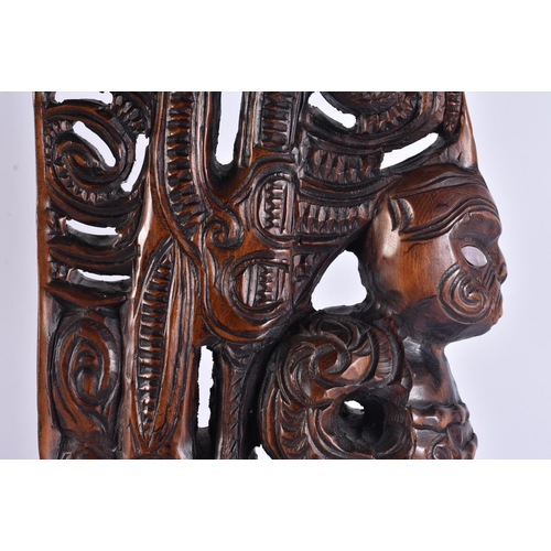 152 - A VERY LARGE NEW ZEALAND MAORI ABELONE SHELL TRIBAL WOOD CARVING. 94 cm x 38 cm.