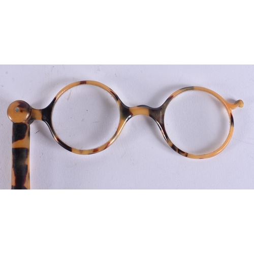 168 - A PAIR OF TORTOISESHELL LORGNETTES. 25 cm long extended.