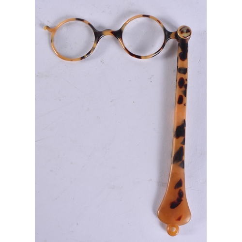 168 - A PAIR OF TORTOISESHELL LORGNETTES. 25 cm long extended.