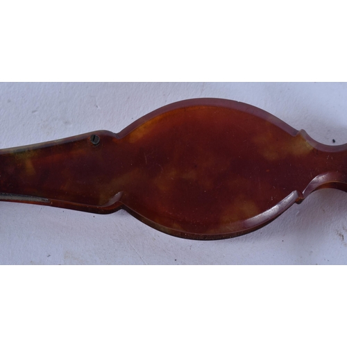 169 - A PAIR OF TORTOISESHELL LORGNETTES. 25 cm long extended.