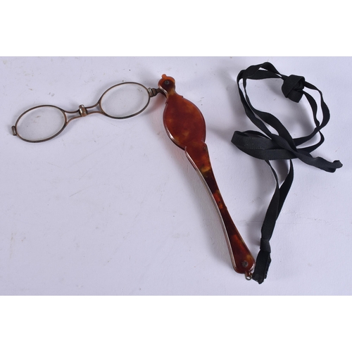 169 - A PAIR OF TORTOISESHELL LORGNETTES. 25 cm long extended.