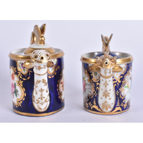 176 - A RARE PAIR OF EARLY 19TH CENTURY ENGLISH PORCELAIN WATERING CANES possibly cruets. 9.5 cm wide.