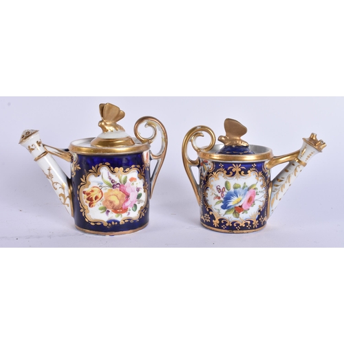 176 - A RARE PAIR OF EARLY 19TH CENTURY ENGLISH PORCELAIN WATERING CANES possibly cruets. 9.5 cm wide.