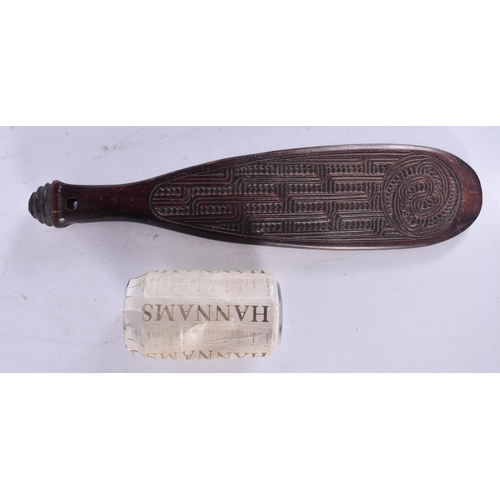 61 - A MAORI TRIBAL CARVED WOOD PATU CLUB. 38 cm long.