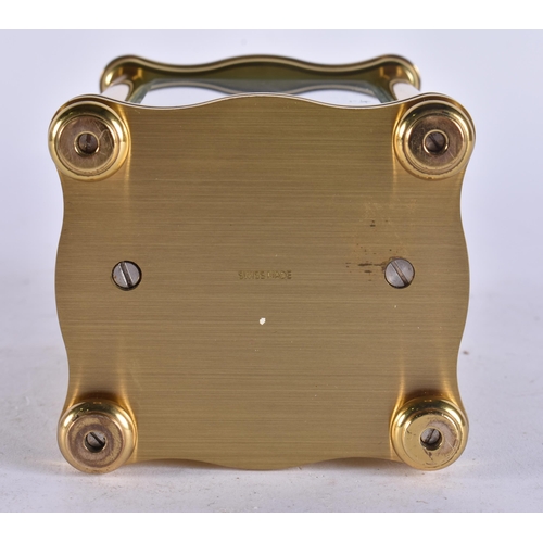 85 - A MATTHEW NORMAN CARRIAGE CLOCK. Working. 14 cm high inc handle.