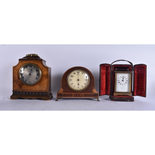 90 - TWO MANTEL CLOCKS together with a leather cased carriage clock. 1 running. (3)