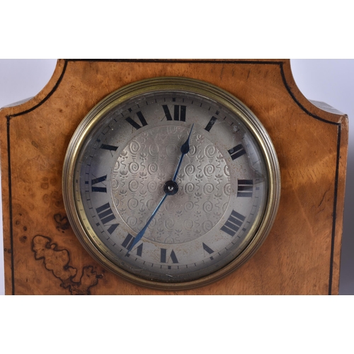 90 - TWO MANTEL CLOCKS together with a leather cased carriage clock. 1 running. (3)