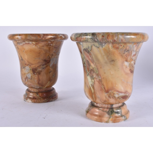 91 - A PAIR OF EARLY 19TH CENTURY GRAND TOUR PUDDINGSTONE VASES of campagna type form. 14 cm x 12 cm.