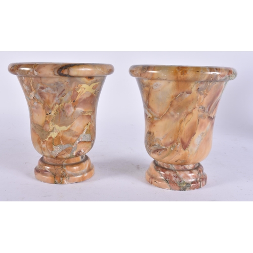 91 - A PAIR OF EARLY 19TH CENTURY GRAND TOUR PUDDINGSTONE VASES of campagna type form. 14 cm x 12 cm.