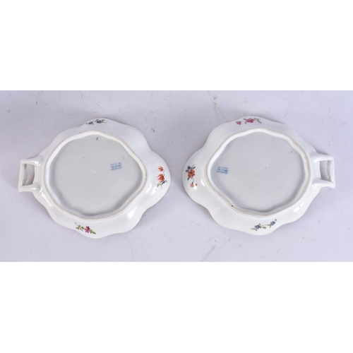 94 - A PAIR OF ANTIQUE DANISH COPENHAGEN PORCELAIN LEAF SHAPED DISHES painted with flowers. 18 cm x 13 cm... 