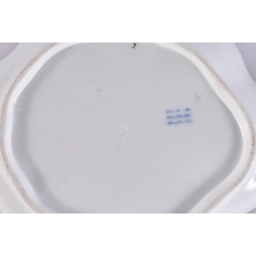 94 - A PAIR OF ANTIQUE DANISH COPENHAGEN PORCELAIN LEAF SHAPED DISHES painted with flowers. 18 cm x 13 cm... 