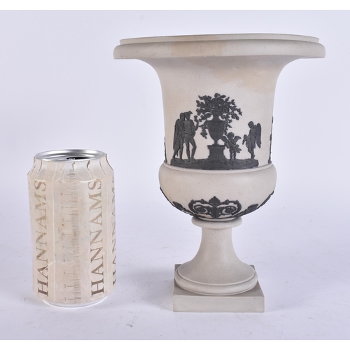 96 - AN EARLY 19TH CENTURY JASPERWARE PEDESTAL VASE decorated with classical figures. 21 cm x 15 cm.