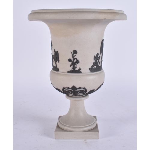 96 - AN EARLY 19TH CENTURY JASPERWARE PEDESTAL VASE decorated with classical figures. 21 cm x 15 cm.