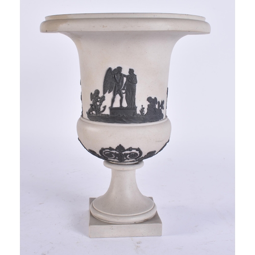 96 - AN EARLY 19TH CENTURY JASPERWARE PEDESTAL VASE decorated with classical figures. 21 cm x 15 cm.