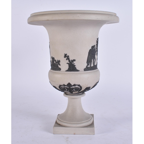 96 - AN EARLY 19TH CENTURY JASPERWARE PEDESTAL VASE decorated with classical figures. 21 cm x 15 cm.