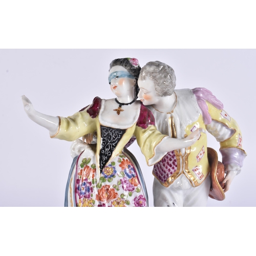99 - AN ANTIQUE GERMAN PORCELAIN FIGURE OF A DANCING MALE AND FEMALE. 20 cm high.