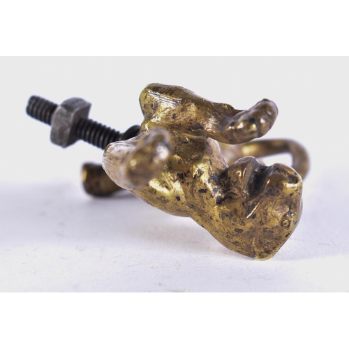 116 - AN ANTIQUE BRONZE JAGUAR CAR MASCOT. 10 cm wide.