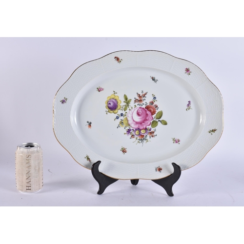 120 - A LARGE HEREND PORCELAIN OVAL DISH painted with flowers. 42 cm x 30 cm.
