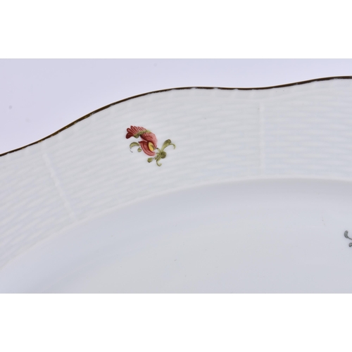 120 - A LARGE HEREND PORCELAIN OVAL DISH painted with flowers. 42 cm x 30 cm.