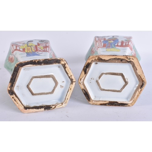 2819 - AN UNUSUAL PAIR OF ANTIQUE DELFT FAMILLE VERTE VASES AND COVERS. 27 cm high.