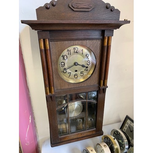 Vintage oak wall clock with pendulum and key, 30" height
