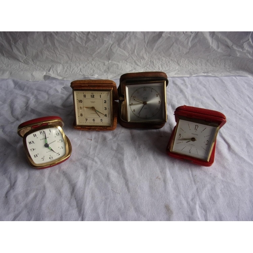 13 - x4 vintage travel clocks