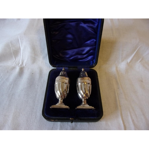 172 - Boxed pair of Victorian salt & pepper shakers c1899 64g