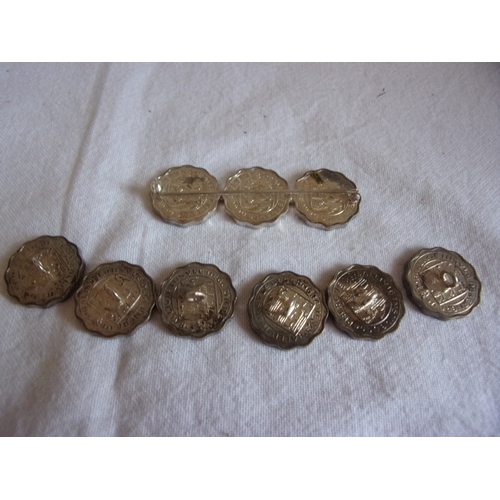 203 - A brooch & 6 buttons made from 1959 Guernsey three pence coins