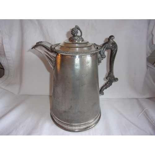 211 - Victorian large pewter jug marked The Wenham Lake Ice Company. Very heavy.