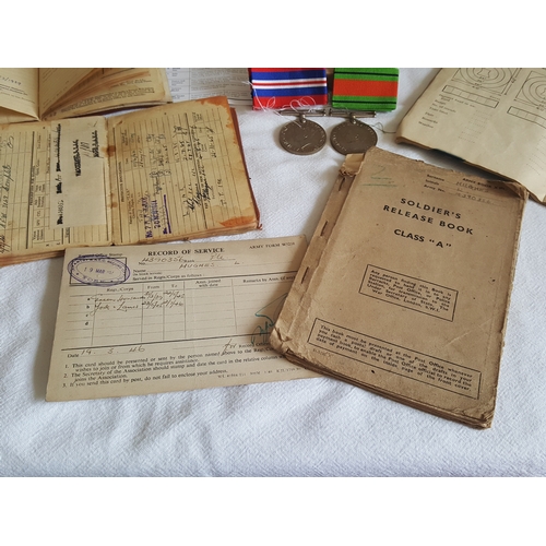 227 - WW2 pair of medals with box & service books